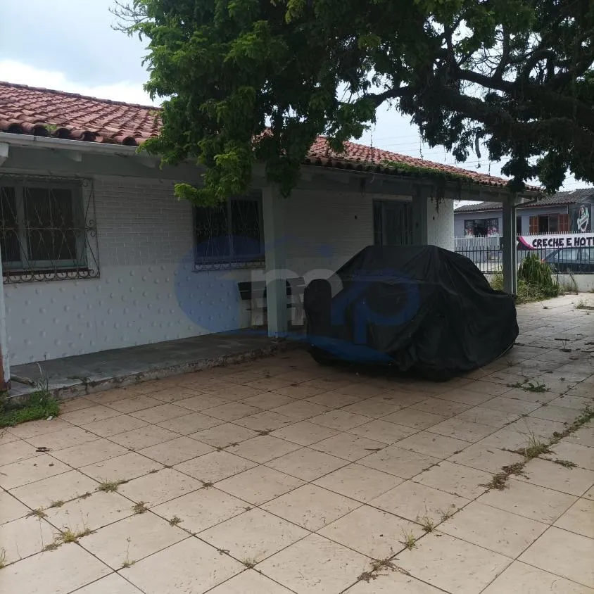 Imagem Casa a venda com 3 dormitorios no centro de Torres/RS