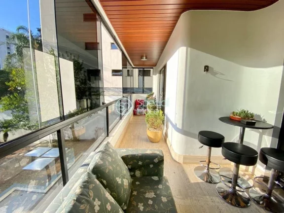 Imagem Lindo, Moderno e Aconchegante!!! Hall de entrada seguido de living para três ambientes com varanda ...