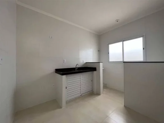Imagem Casa com 2 dormitórios à venda, 51 m² por R$ 245.000 - Caiçara - Praia Grande/SP