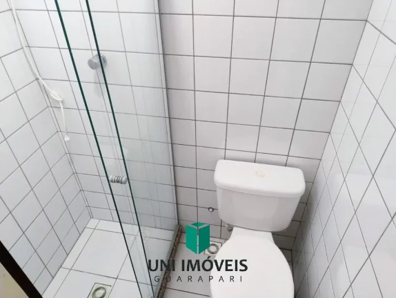 Imagem Oportunidade no Centro de Guarapari: Apartamento Amplo com 2 Quartos + Quarto Reversível e garagem
