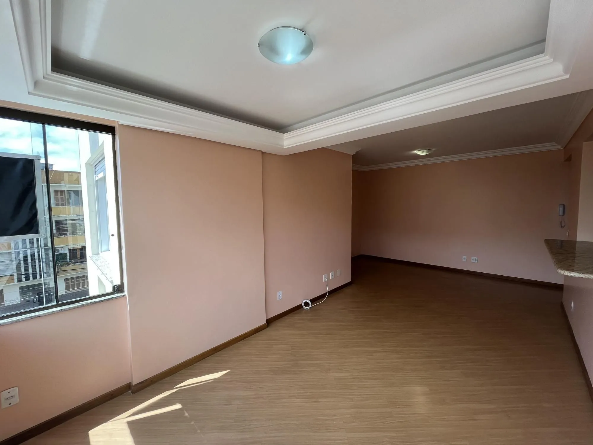 Imagem Apartamento de dois quartos, suíte e uma vaga de garagem no bairro Menino Deus