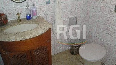 Imagem Casa para Venda - 125m², 3 dormitórios, 5 vagas - Menino Deus