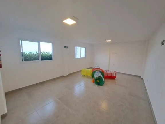 Imagem Apartamento com 2 dormitórios à venda, 56 m² por R$ 320.000 - Caiçara - Praia Grande/SP