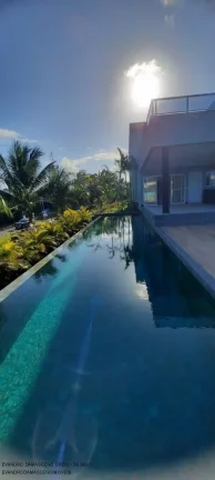 Imagem Casa de luxo em condomínio à venda em Busca Vida, Camaçari-BA: 4 quartos, 4 suítes, 2 salas, 2 banheiros, 4 vagas, 400m².