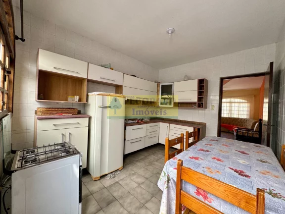 Imagem Sobrado de 2 quartos em condomínio fechado na Martim de Sá, Caraguatatuba-SP: 400mts da Praia, 76m², 1 vaga - Imperdível!