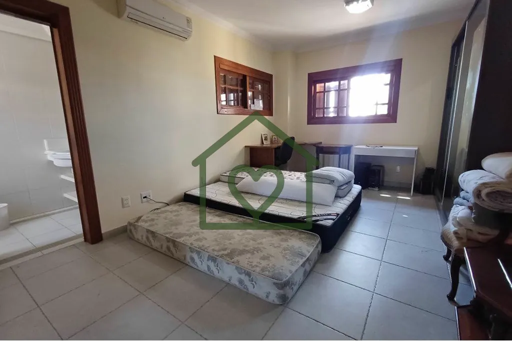 Imagem Desfrute do conforto e sofisticação com esta espetacular casa à venda no bairro Partenon, em Port...