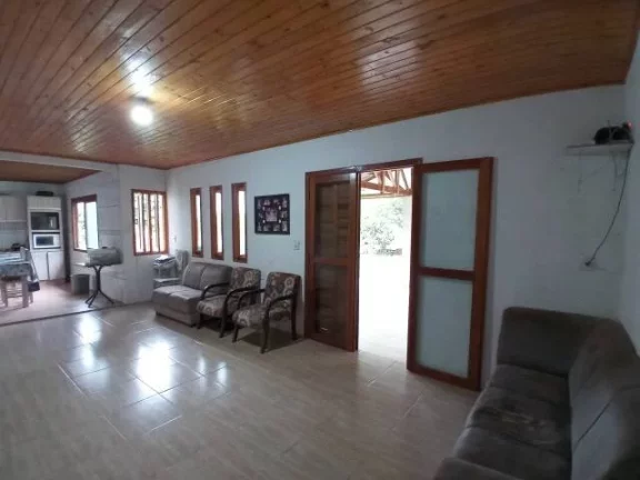 Imagem Sítio com Casa em condomínio Fechado, Próximo da portaria, junto a RS040