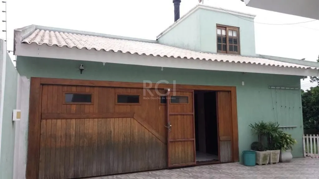 Imagem Casa com 3 dormitórios à venda, 230,11 m² por R$ 900.000,00 - Igara III - Canoas/RS