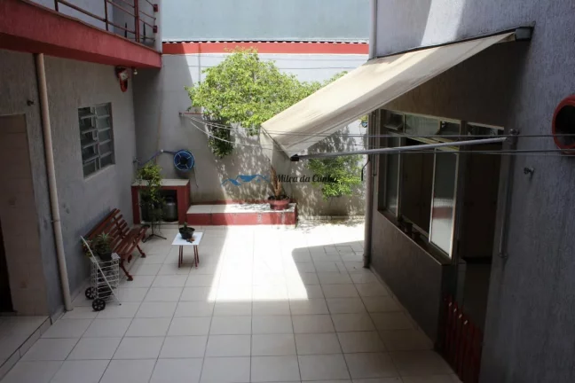 Imagem Sobrado à Venda com 3 dormitórios 3 vagas com Casa nos Fundos, Homero Thon , Santo André