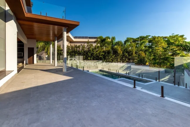 Imagem Casa de alto padrão sobrado com 4 suítes em um projeto moderno e encantador com área gourmet,
laz...