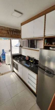 Imagem Sobrado triplex com 2 suítes à venda, 199 m² por R$ 675.000 - Massaguaçu - Caraguatatuba/SP