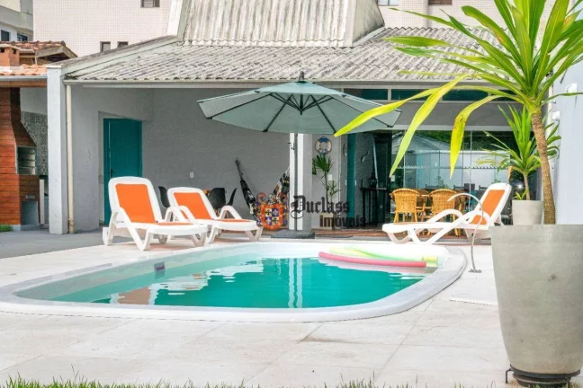 Foto do imóvel Casa com 3 dormitórios à venda, 210 m² por R$ 1.385.000,00 - Itaguá - Ubatuba/SP