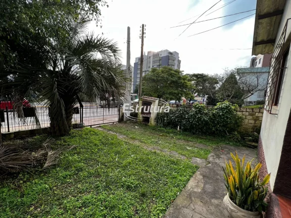 Imagem Amplo terreno com 3 residencias para moradia em Santa Maria - RS