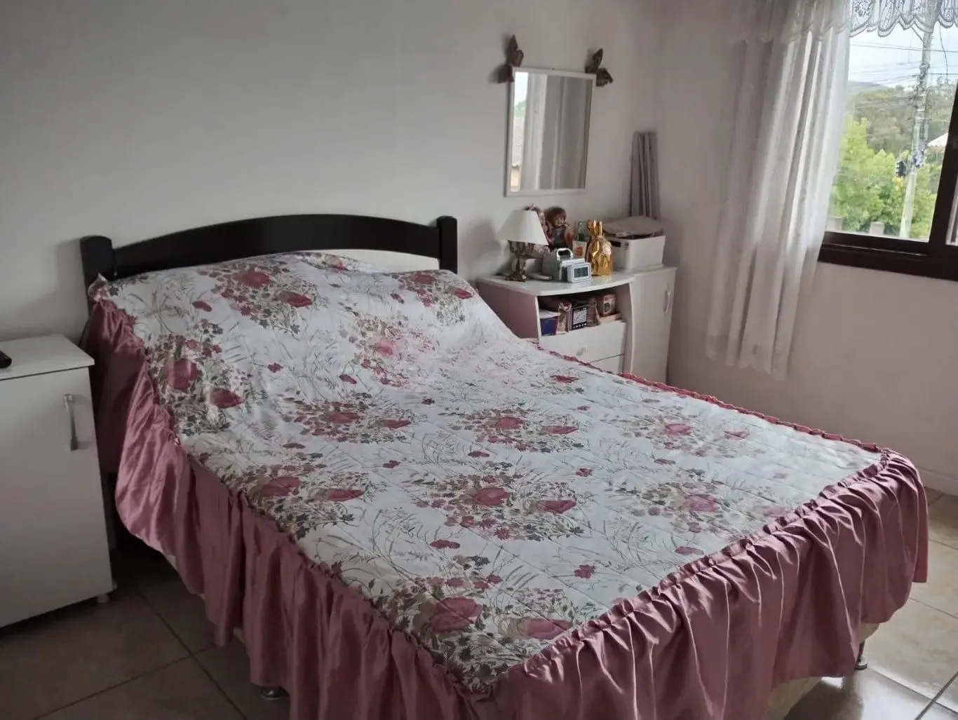 Imagem Casa de 3 dormitórios e 111m² à venda em Jardim Botânico, Porto Alegre.
