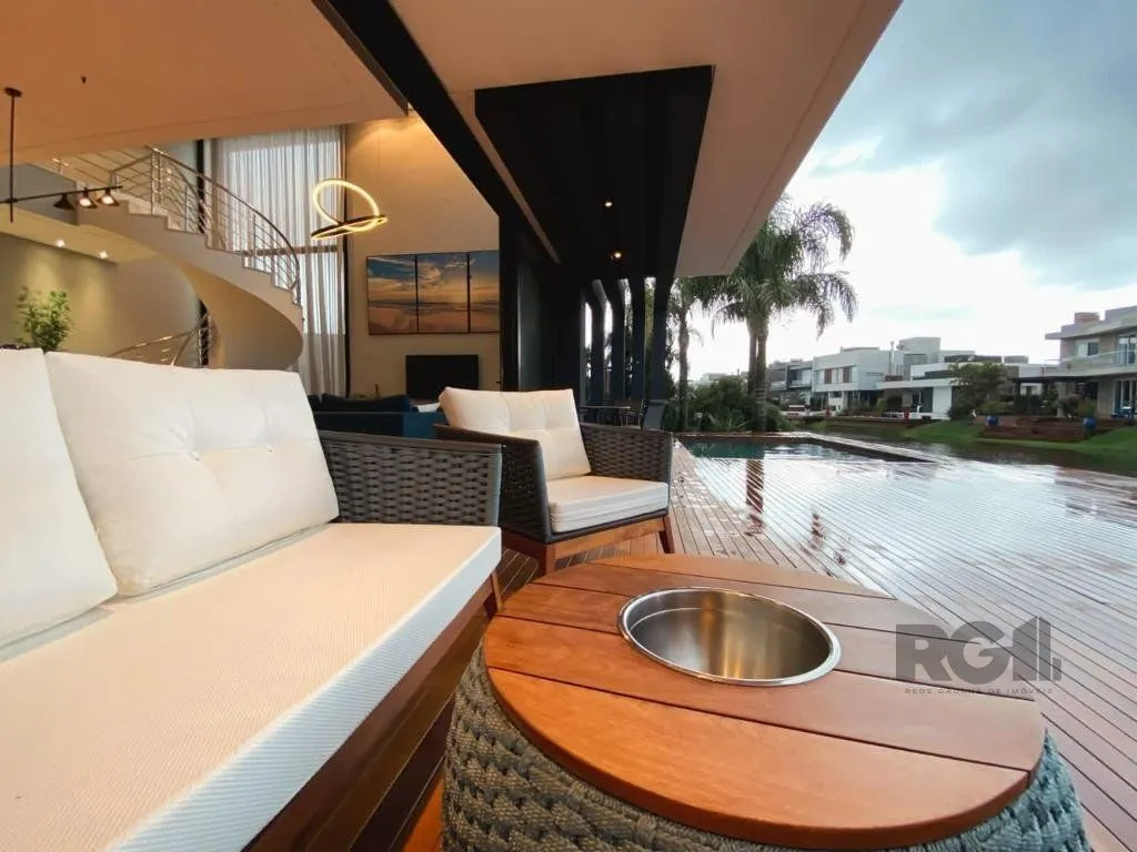 Imagem Casa de Condomínio em Atlântida Sul