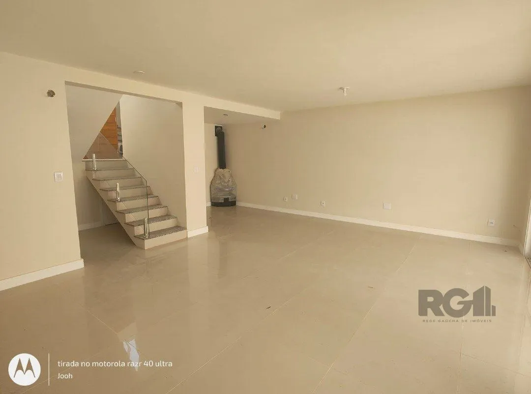 Imagem Casa em Condomínio fechado com 3 dormitórios no bairro Vila Nova em Porto Alegre, RS