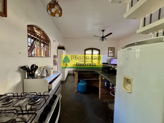 Imagem Casa à venda em Caraguatatuba Martim de Sá 3 quartos, 3 suítes, 1 sala, 3 banheiros, 10 vagas de garagem. 166m² de área.
