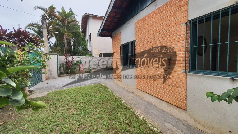 Imagem Sobrado 4 dormitórios no Guarujá, bairro Jardim Vigínia
