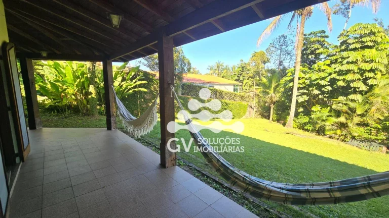 Foto do imóvel Casa com 3 dormitórios à venda, por R$ 1.400.000 - Condomínio Recanto da Lagoinha - Ubatuba/SP