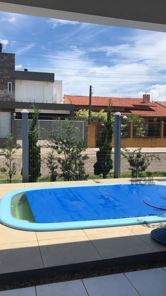 Imagem Casa 3 dormitórios + piscina + 4Vagas garagem + 2 quadras mar
