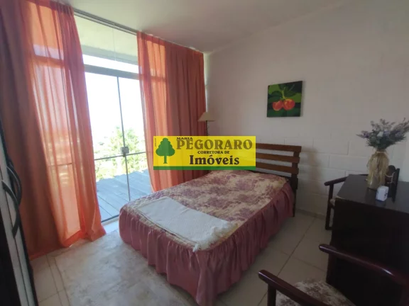 Imagem Casa à venda em Caraguatatuba-SP: 3 quartos, suíte, sala com vista para o mar e deck com hidro!