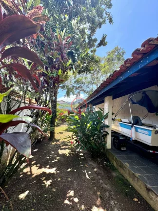 Imagem CASA CHARMOSA ;BOISSUCANGA,2 DORMITÓRIOS,SALA AMPLA,AVARANDADA,EDICULA COM QUARTO AMPLO E BANHEIRO, ARVORES FRUTIFERAS EM 581 MT2