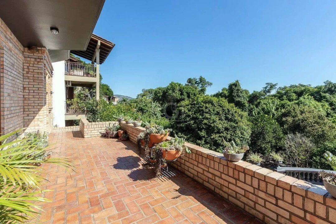 Imagem Casa Condominio para Venda - 559m², 4 dormitórios, sendo 3 suites, 3 vagas - Cavalhada