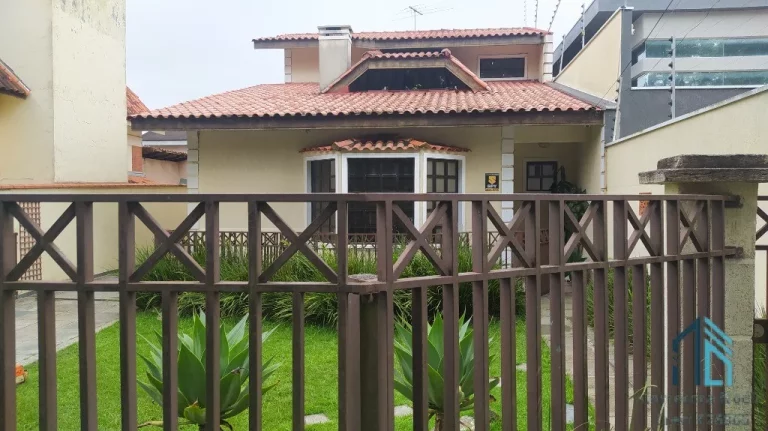 Imagem (Permuta ou financiamento) Casa a venda com amplo terreno, 04 quartos c/suíte, 05 vagas, salão de festas, no Tarumã em Curitiba PR