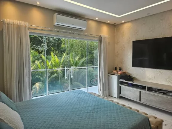 Imagem Casa Espetacular na Ponta Negra ,em um grande terreno, a casa conta, com 4 suítes, piscina , energia solar , campo de futebol, aceita financiamento