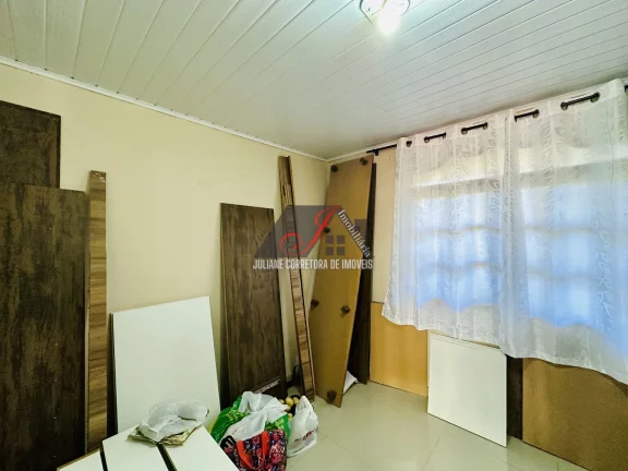 Imagem Terreno à venda com 02 casas no Bairro Thomaz Coelho em Araucária/PR.