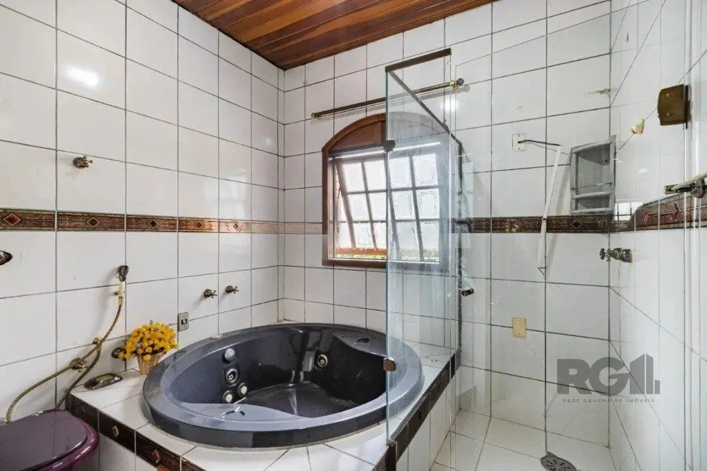 Imagem Casa com 3 dormitórios no bairro Passo das Pedras