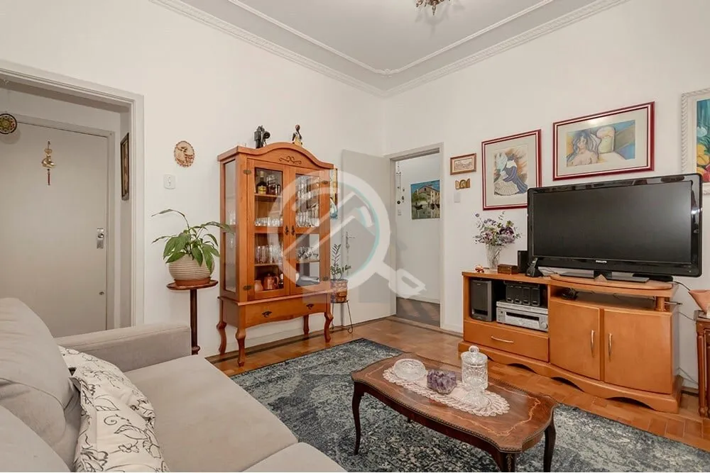 Imagem Excelente apartamento térreo localizado no bairro Menino Deus. Imóvel com 76m² distribuído em 2 ...