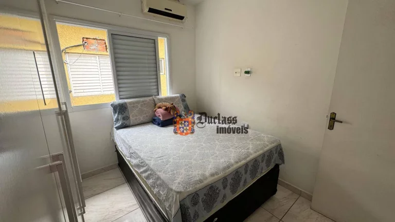 Imagem Sobrado com 2 dormitórios à venda, 62 m² por R$ 430.000,00 - Vila Guilhermina - Praia Grande/SP