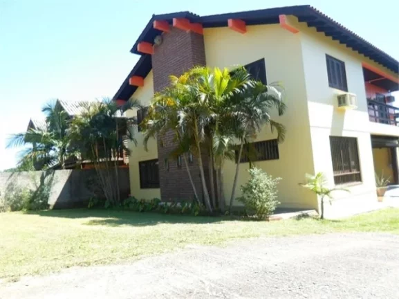 Imagem Belíssimo Sobrado em condomínio fechado, Centro de Águas Claras / Viamão