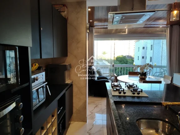 Imagem Imperdível! Apartamento de 2 quartos com suíte e 2 vagas de garagem em Pitangueiras, Guarujá-SP - 78m² de conforto e elegância!