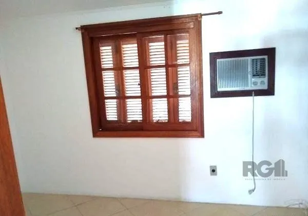 Imagem Casa em condominio no bairro Tristeza de 3 dormitórios e vaga