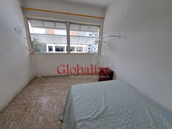 Imagem Apartamento à venda com 70m², 2 quartos, varanda, frente a praia por R$480.000,00 no José Menino em Santos