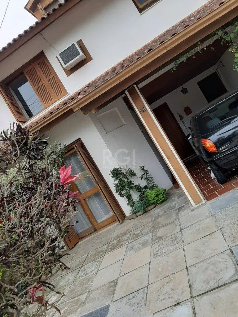 Imagem Casa Condominio para Venda - 129.58m², 3 dormitórios, sendo 1 suites, 4 vagas - Cavalhada
