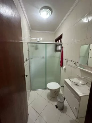 Imagem Sobrado com 3 dormitórios à venda, 147 m² por R$ 650.000 - Tupi - Praia Grande/SP