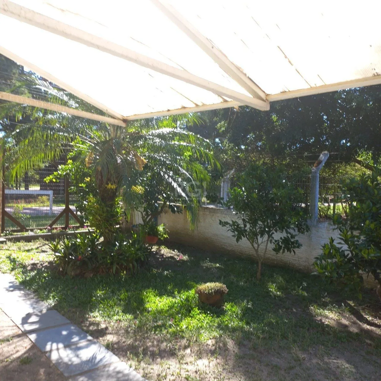 Imagem 2 Casa com 4 quartos, 2 vagas de garagem, no bairro Belém Novo, Porto Alegre/RS