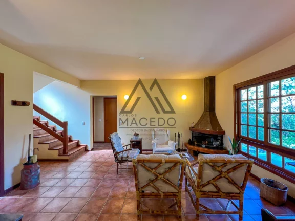 Imagem Casa típica da Granja Viana, em condomínio com mata Atlântica predominante. Propriedade exclusiva...