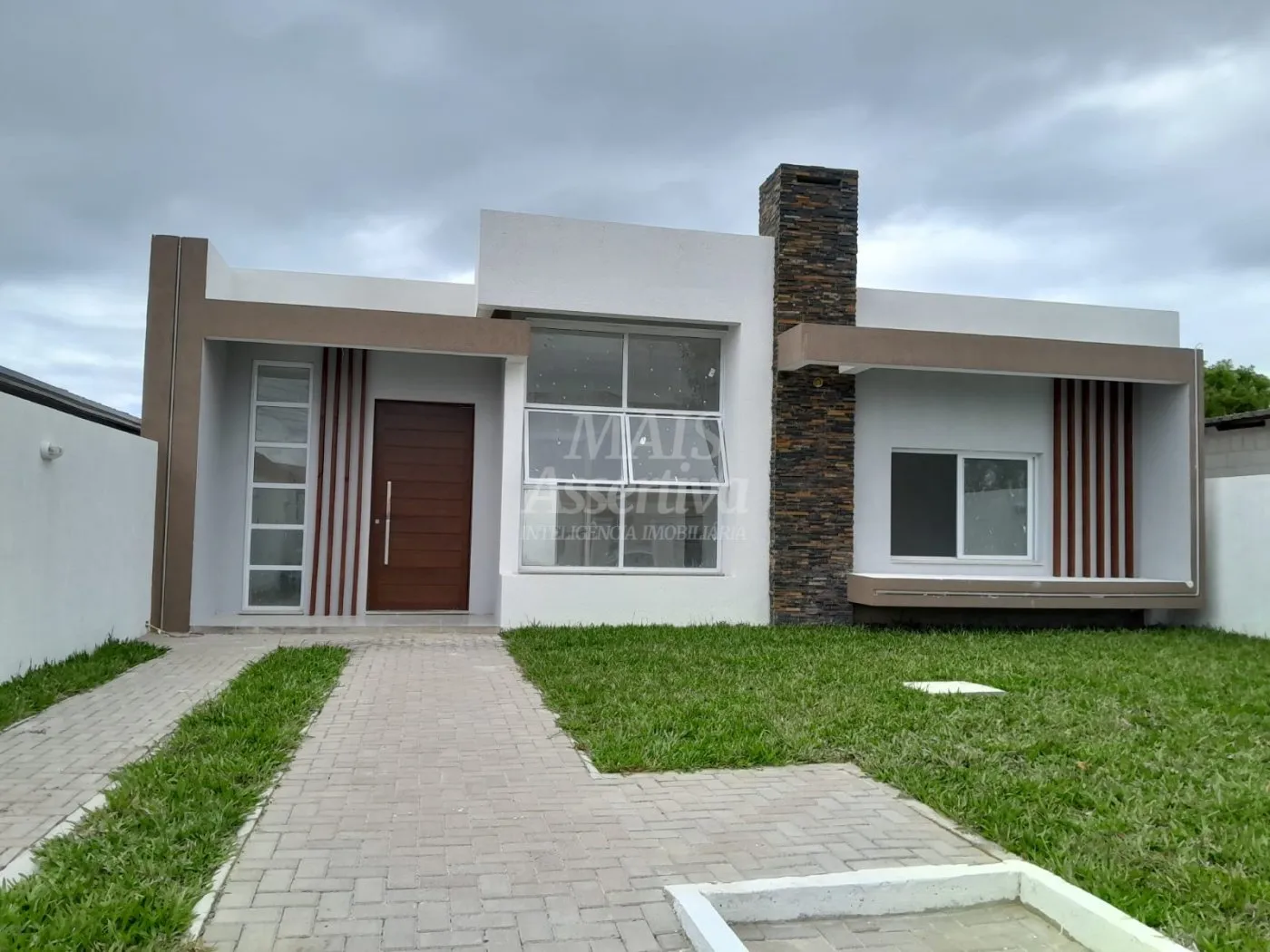 Foto do imóvel Excelente casa a venda localizada no centro de Tramandaí/RS - 2 dormitórios