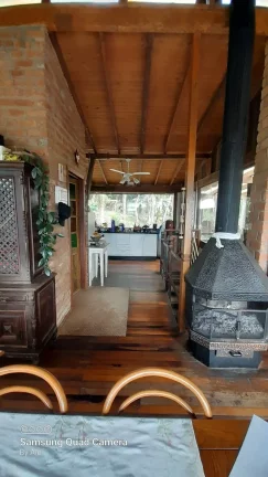 Imagem Casa Rústica em Garopaba-SC: 3 Suítes, Vista Panorâmica, Jacuzzi e 3000m² de Terreno