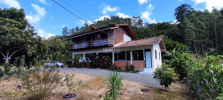 Imagem Sítio a venda, Com casa e lagoa de peixes, e riacho atravessado o terreno a 300 metros da SC 108. Boa área de 4.000m² de plantio com terra boa,