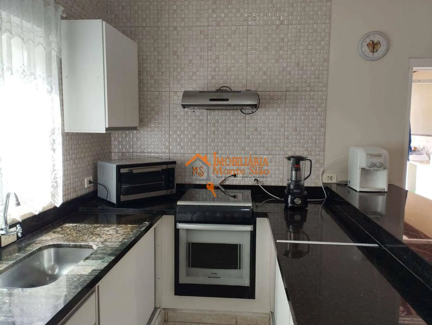 Imagem Sobrado com 3 dormitórios à venda, 220 m² por R$ 680.000,00 - Vila Caputera - Mogi das Cruzes/SP
