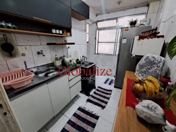 Imagem Apartamento à venda com 61m², 2 quartos, 1 banheiro, elevador e portaria por R$266.000,00 no José Menino em Santos.