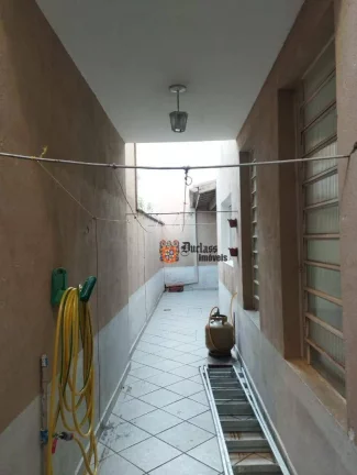 Imagem Sobrado com 4 dormitórios à venda por R$ 480.000,00 - Centro - Taubaté/SP