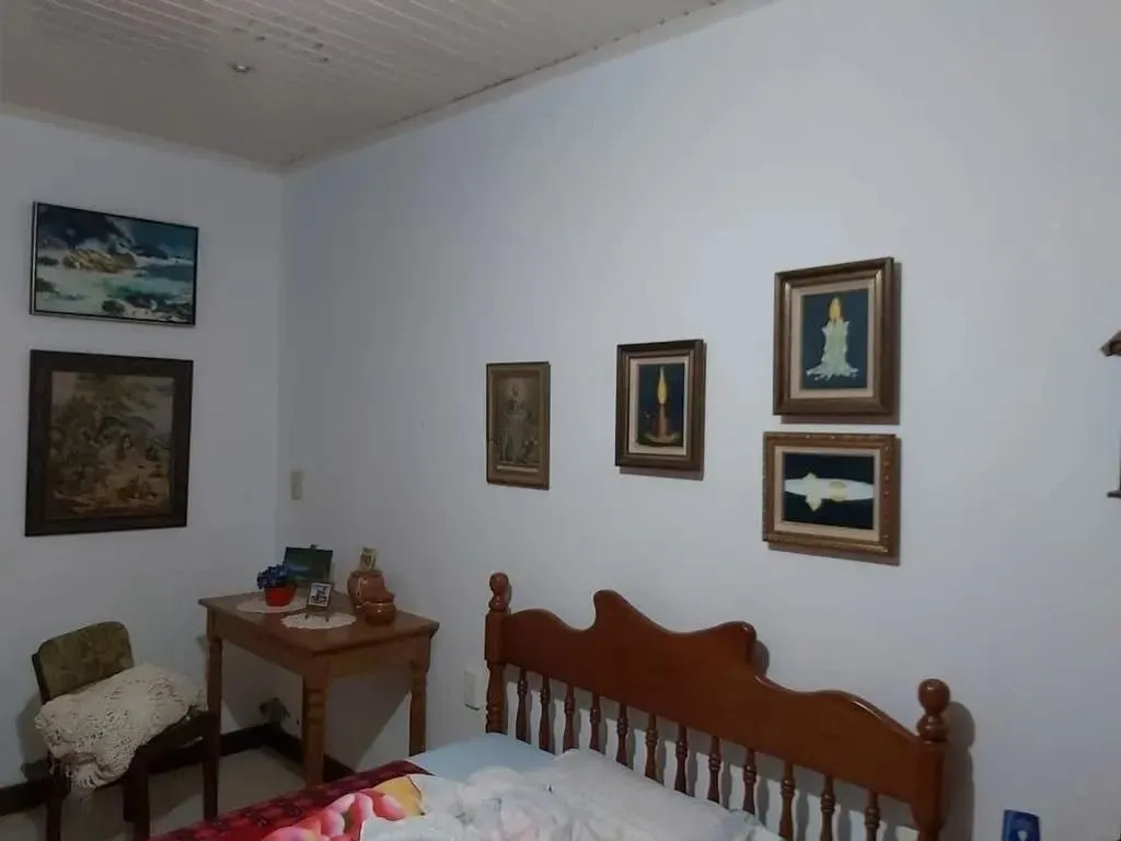 Imagem Casa com 4 dormitórios no bairro Passo da Areia