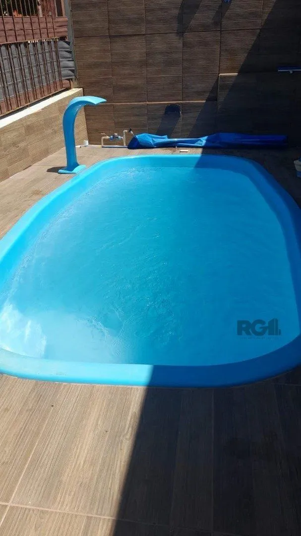 Imagem Casa 2 dormitórios com piscina na Vila Nova Porto Alegre