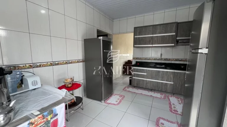 Imagem Terreno com Duas Casas Térreas – Oportunidade para Investir ou Morar Bem